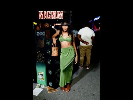 Right: Samoya Pinder showed off her sophisticated style wearing an olive green maxi skirt set.